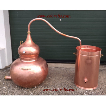 Traditional 150 litre alembic still with drain for distilling liquids.